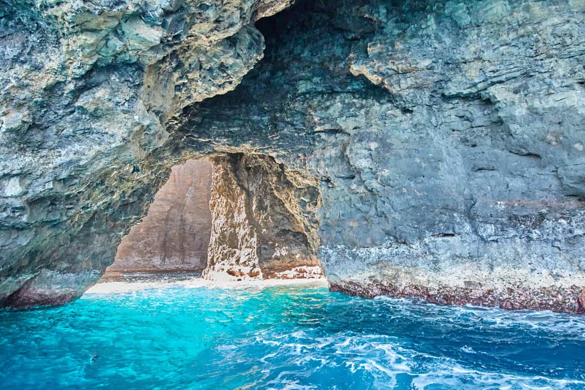 A sea arch along the Na Pali Coast of Kauai, Hawaii